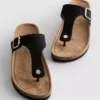 Sandalias tipo mule con barra en T y hebilla