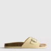 Sandalias tipo mule con correa y hebilla