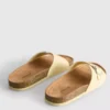 Sandalias tipo mule con correa y hebilla