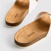 Sandalias tipo mule con correa y hebilla