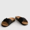 Sandalias tipo mule con correa y hebilla