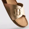 Sandalias tipo mule con correa y hebilla