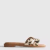 Sandalias tipo mule con tiras cruzadas