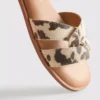 Sandalias tipo mule con tiras cruzadas