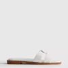 Sandalias tipo mule con tiras trenzadas