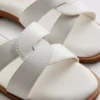 Sandalias tipo mule con tiras trenzadas