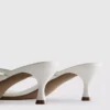 Sandalias tipo mule con zapatos de tacón y tiras entre los dedos