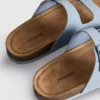 Sandalias tipo mules con doble correa de hebilla