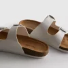 Sandalias tipo mules con doble correa de hebilla