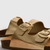 Sandalias tipo mules con doble correa de hebilla