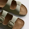 Sandalias tipo mules con doble correa de hebilla