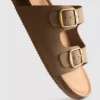 Sandalias tipo mules con doble correa de hebilla