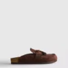 Sandalias tipo zueco con borlas de ante sintético