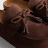 Sandalias tipo zueco con borlas de ante sintético