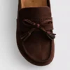 Sandalias tipo zueco con borlas de ante sintético