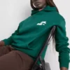 Sudadera con capucha de estilo deportivo y corte holgado