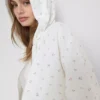 Sudadera con capucha y cremallera floral de alto contenido en algodón