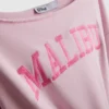 The Primark Scene | Sudadera con hombros al aire y eslogan