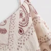 Top camisero largo de satén arrugado de Paula Echevarría