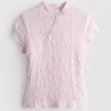 Top con cuello alto texturizado