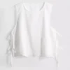 Top con lazo lateral bordado