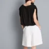 Top corto con caída, rico en modal