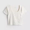 Top corto con cuello redondo supersuave