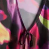 Top corto de malla con detalle de lazo
