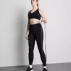 Top corto deportivo sin costuras con espalda cruzada