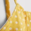 Top de bikini con aros, escote corazón y lunares