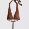 Top de bikini con cuello halter y estampado de leopardo de Paula Echevarría