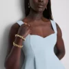 Top de crepé con peplum y escote corazón