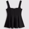Top de crepé con peplum y escote corazón