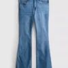 Vaqueros acampanados de algodón denim de talle medio