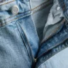 Vaqueros acampanados de algodón denim de talle medio