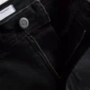 Vaqueros acampanados de algodón denim de talle medio