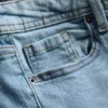 Vaqueros acampanados de algodón denim de talle medio