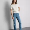 Vaqueros acampanados de denim de algodón de talle medio