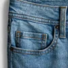 Vaqueros acampanados de denim de algodón de talle medio