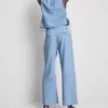 Vaqueros de algodón denim con pliegues y pernera ancha