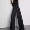 Vaqueros de algodón denim de talle medio y pierna ancha