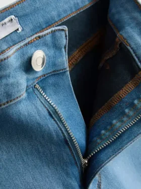 Vaqueros pitillo de talle medio Essential | corte regular