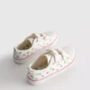 Zapatillas bajas de lona con estampado floral