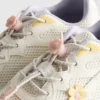 Zapatillas de suela gruesa con detalles florales