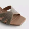 Zapatillas tipo mules con tacón grueso y tiras cruzadas decoradas